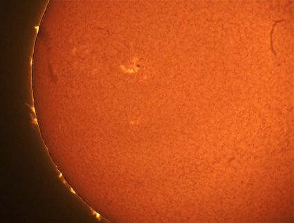 Hydrogen alpha image of the Sun showing prominences and active region 0715