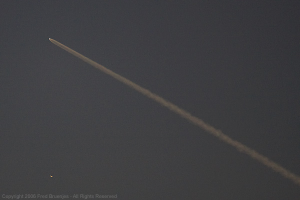 Photo of semi-transparent trail from the Delta IV rocket during the NROL-22 launch